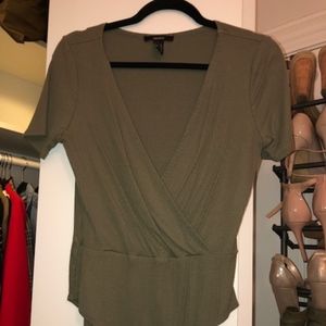 Green low neck bodysuit